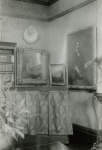 Unknown artist (19th century): Photograph of Interior of De Pass's residence, Cliffe House, Falmouth - Shows portrait of Alfred De Pass by H.S.Tuke, photograph, 15 x 10.5 cms. Presented by Catherine Wallace.